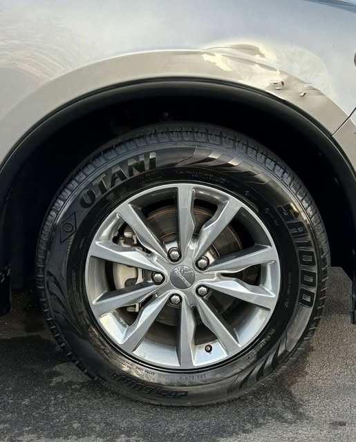 Same wheel bright and clean with dressed tire after