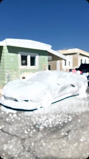 Camaro in foam during a decontamination wash